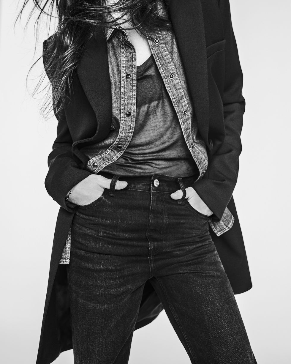 charlotte gainsbourg wears her zara denim collection in a black and white photograph