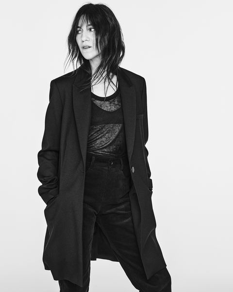 charlotte gainsbourg wears denim and a trench coat from her new denim collection for zara