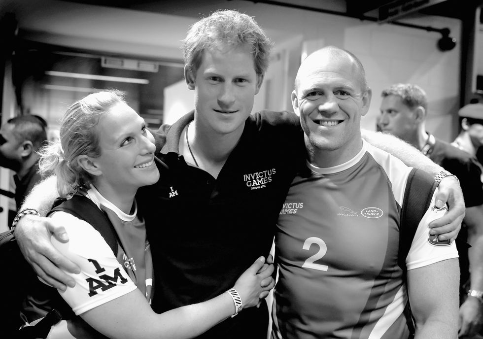 london, england september 12 editors note this image has been converted to black and white prince harry, zara phillips and mike tindall pose for a photograph after competing in an exhibition wheelchair rugby match at the copper box ahead of tonights exhibition match as part of the invictus games at queen elizabeth park on september 12, 2014 in london, england the international sports event for wounded warriors, presented by jaguar land rover was an idea developed by prince harry after he visited the warrior games in colorado usa the four day event has brought together thirteen teams from around the world to compete in nine events such as wheelchair basketball and sitting volleyball photo by chris jacksongetty images