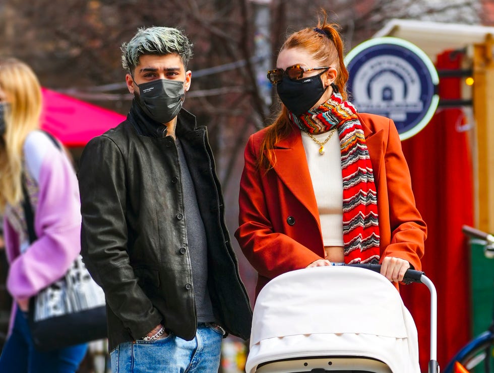 Gigi Hadid takes her daughter out for a stroll during a lunch outing with  Bella Hadid