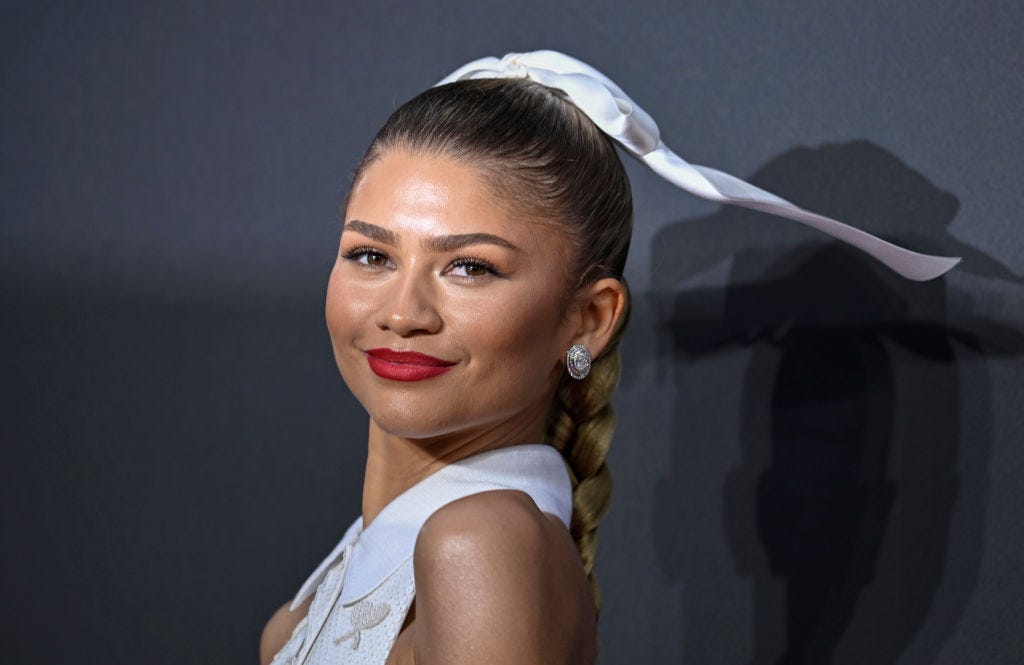 Zendaya looks unreal in a white pleated tennis-themed gown for the UK Challengers premiere