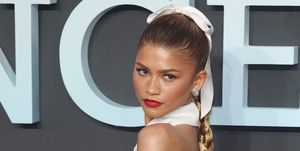 zendaya on the red carpet with a blonde ponytail
