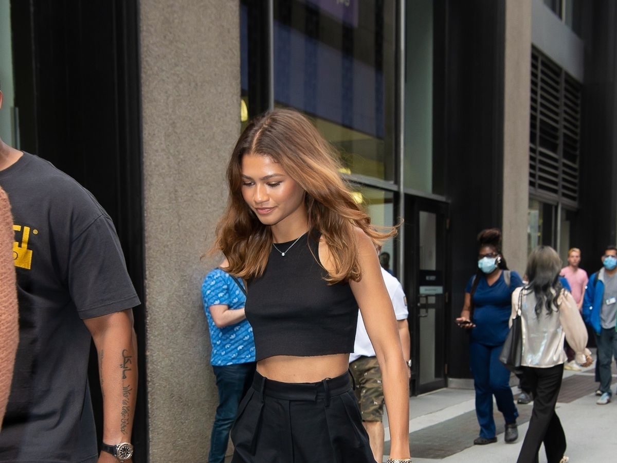 Zendaya keeps it simple in a black shirt and blue jeans while stepping out  for lunch with her assistant in Los Angeles-250523_4