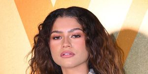 zendaya poses for a photocall at the louis vuitton menswear spring summer 2024 show