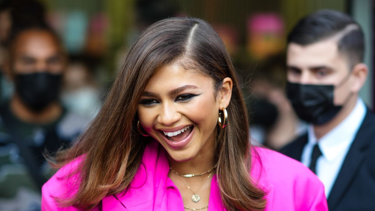 Zendaya Flaunts Legs In A High-Slit Midi Dress And Boots In NYC