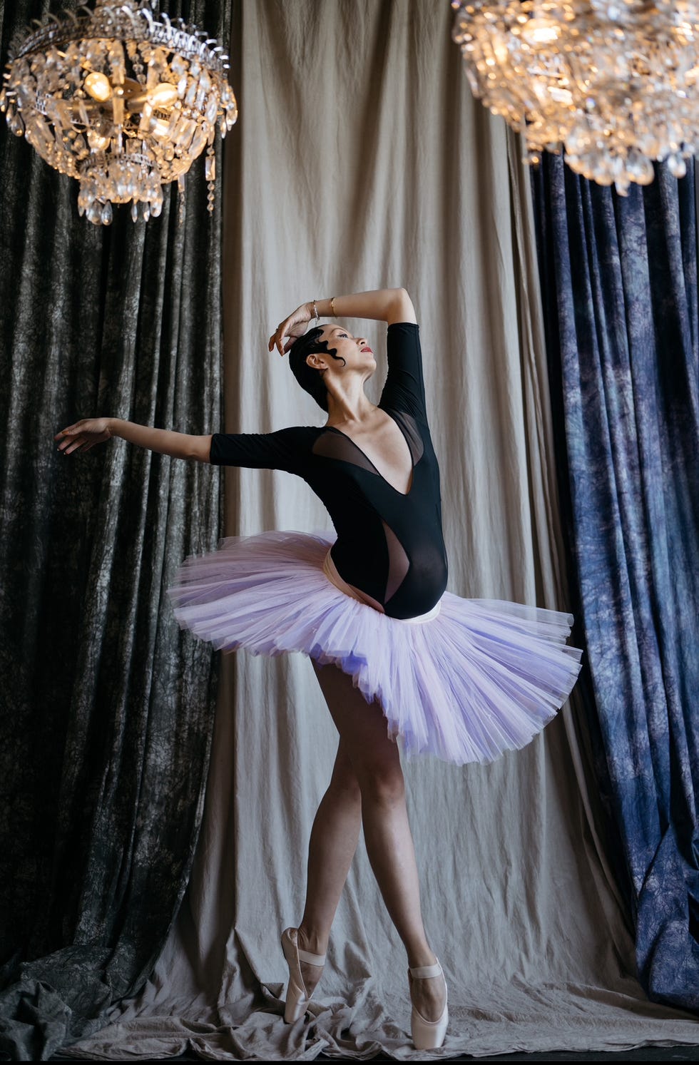 a pregnant ballerina dancer on pointe