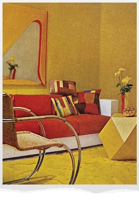 yellow living room with red sofa