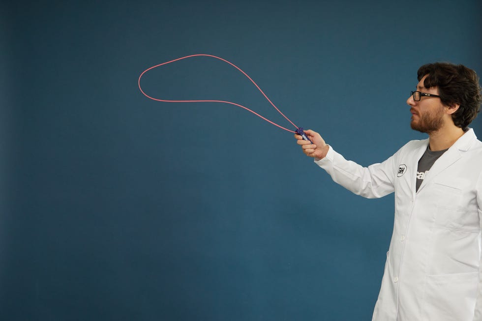 alec uses the zipstring against a blue background