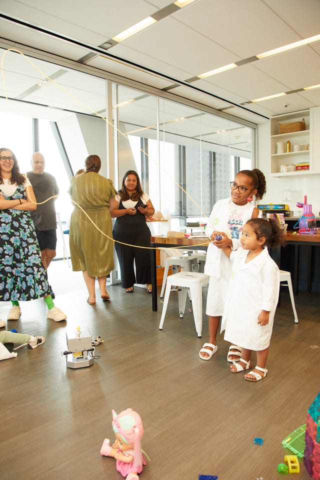 kids play with the zipstring together in the good housekeeping institute labs