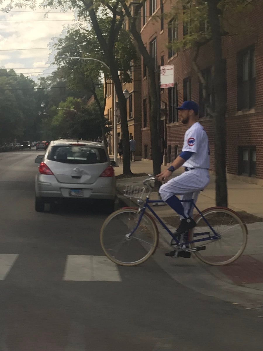 Ben Zobrist rode his bike to work sporting full Cubs uniform and PF Flyers