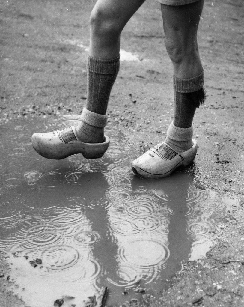 4th october 1958  18 year old alan jennings wearing clogs bought in holland to combat the mud at a gathering of queens scouts at gilwell park, chingford  photo by william vandersonfox photosgetty images