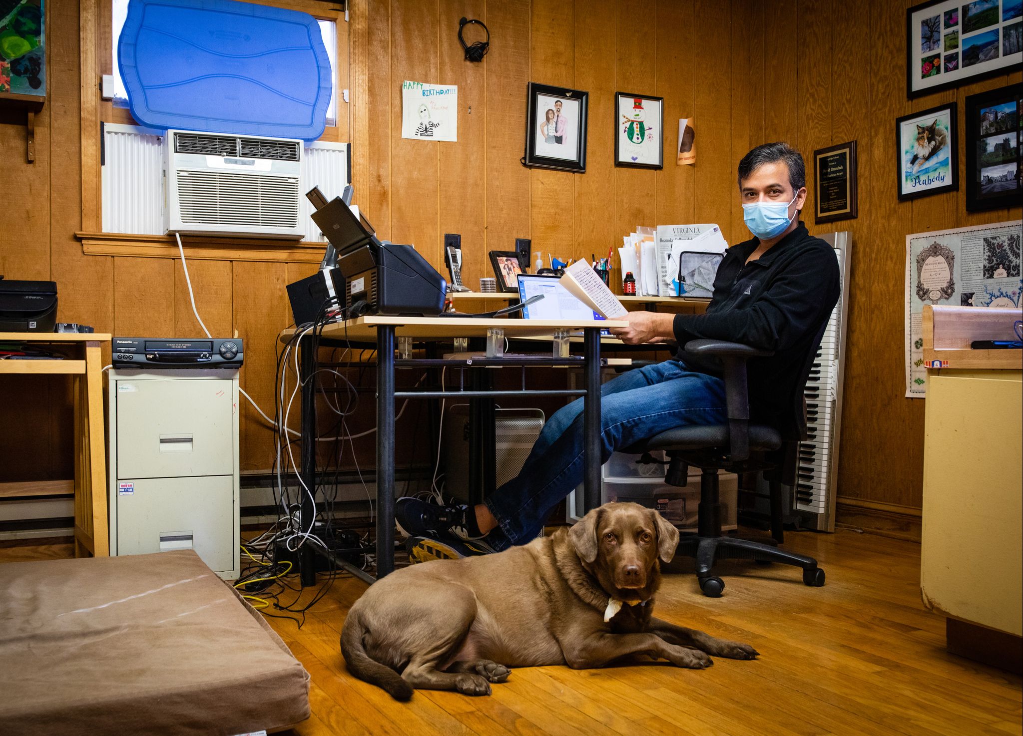 david oranchak at his computer with dog where he did most of his work to crack the code