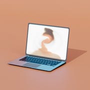 zoom dysmorphia computer generated image of a laptop with blurred face on screen