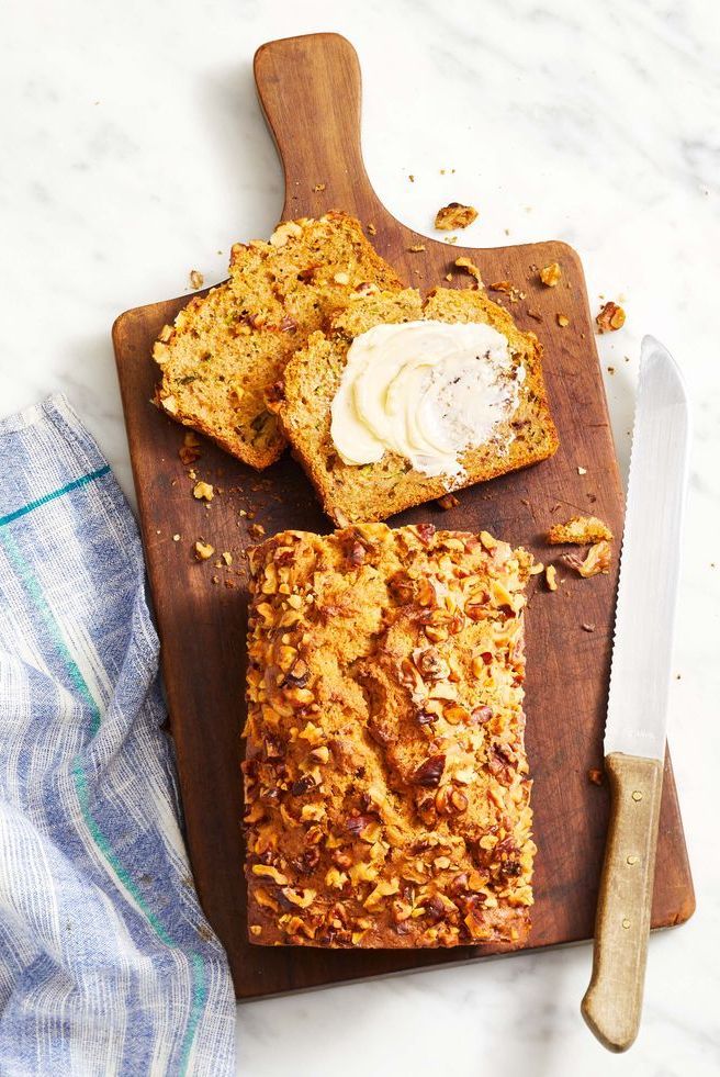 zucchini bread with butter spread on top