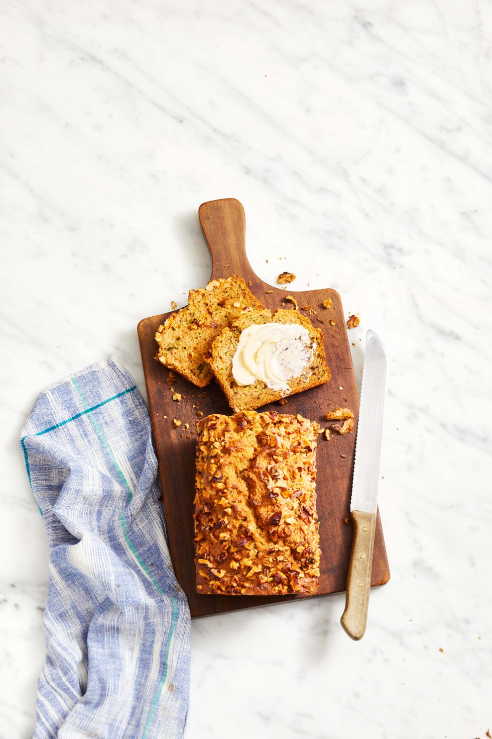 zucchini bread with butter spread on top