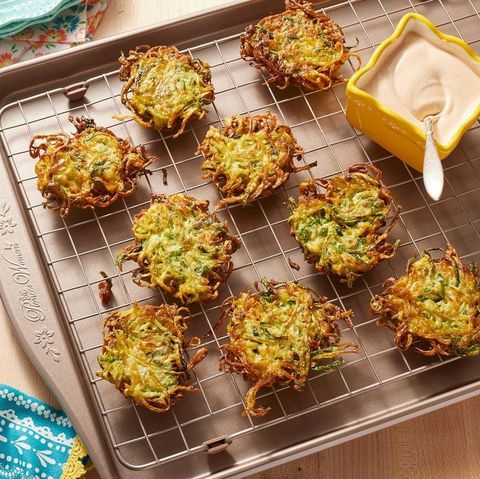 zucchini fritters with chipotle crema on wire rack