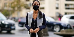 paris, france   september 29 tamara kalinic wears a black protective face mask, a gray leather bag, khaki pants, a gray sleeveless jacket, a dark blue top, leather shoes, outside coperni, during paris fashion week   womenswear spring summer 2021 on september 29, 2020 in paris, france photo by edward berthelotgetty images