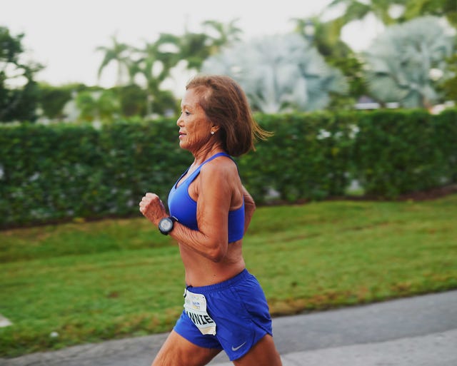 a woman running in a race