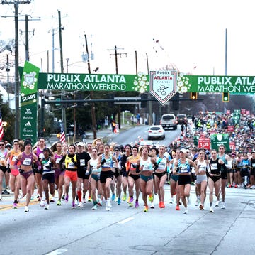 Runners at the starting line of a marathon event Runners at the starting line of a marathon event