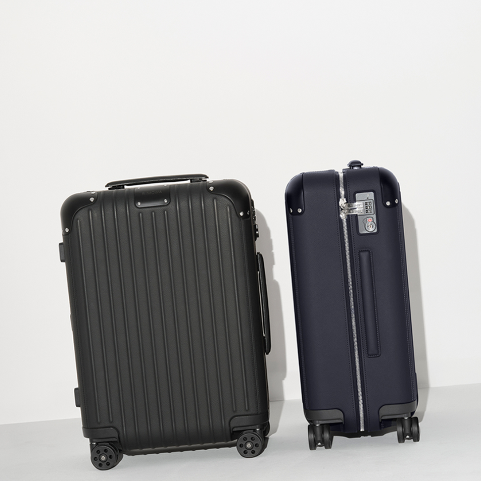 a couple of black suitcases