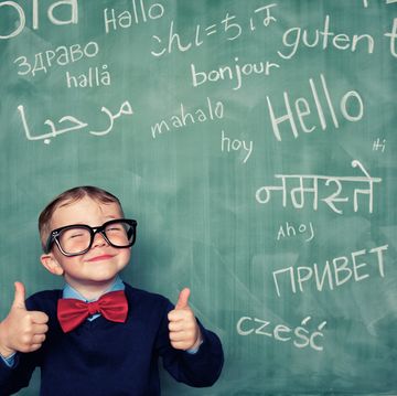 a young language master boy knows how to say hello in many different languages all languages and cultures are beautiful