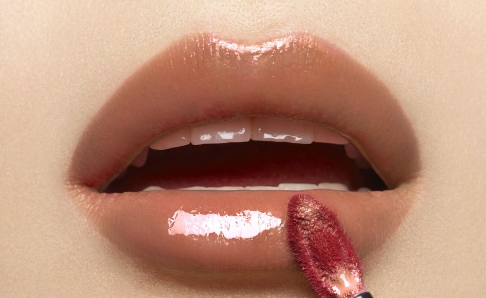 Lip, Lip gloss, Mouth, Cheek, Nose, Beauty, Lipstick, Close-up, Chin, Material property, 
