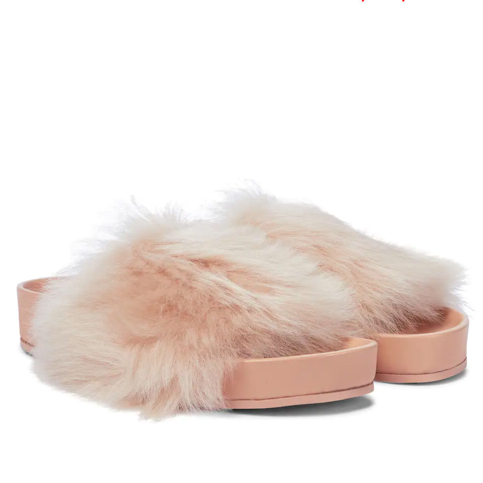 christian louboutin
coolito shearling backless loafers