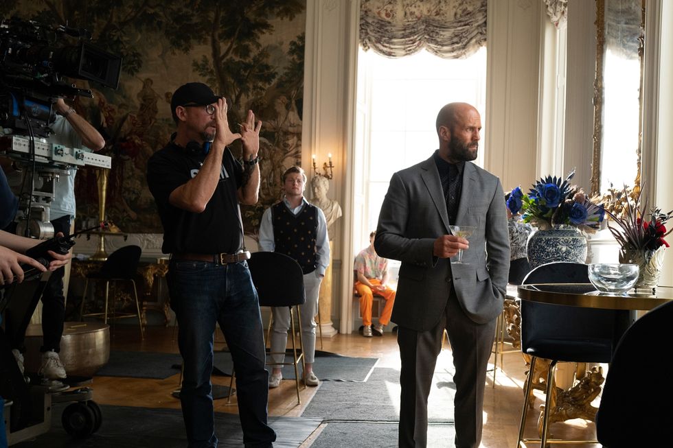 l to r director david ayer and actor jason statham on the set of the beekeeperan amazon mgm studios filmphoto credit daniel smith copy 2024 metro goldwyn mayer pictures inc all rights reserved