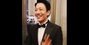 Suit, Facial expression, Formal wear, White-collar worker, Tuxedo, Chin, Snapshot, Tie, Forehead, Smile, 