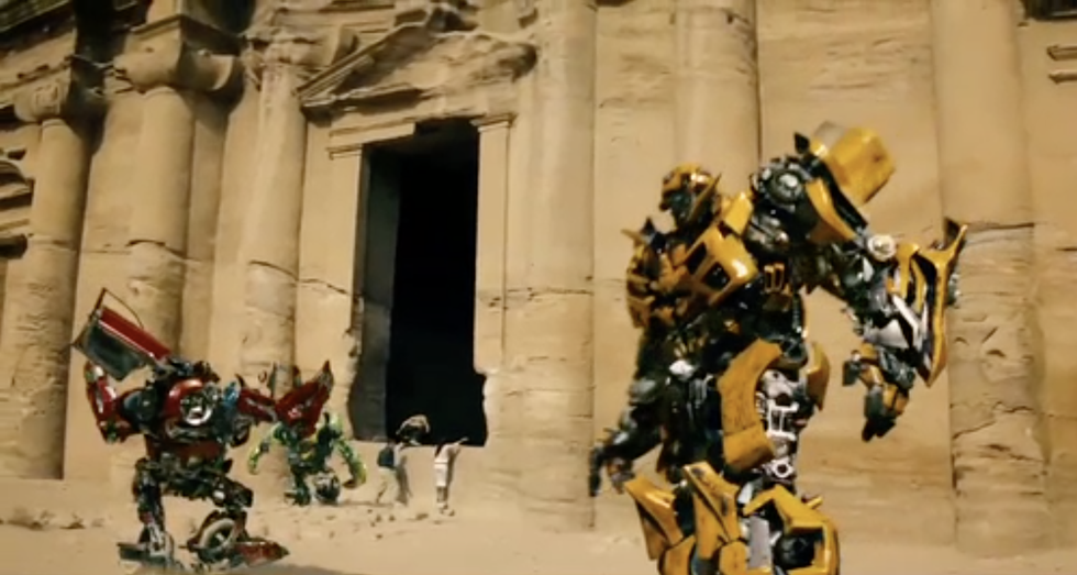 Transformers, Mecha, Yellow, Fictional character, Action figure, Art, Robot, Machine, Tourist attraction, 