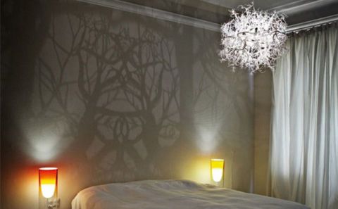 chandelier that turns room into haunted forest