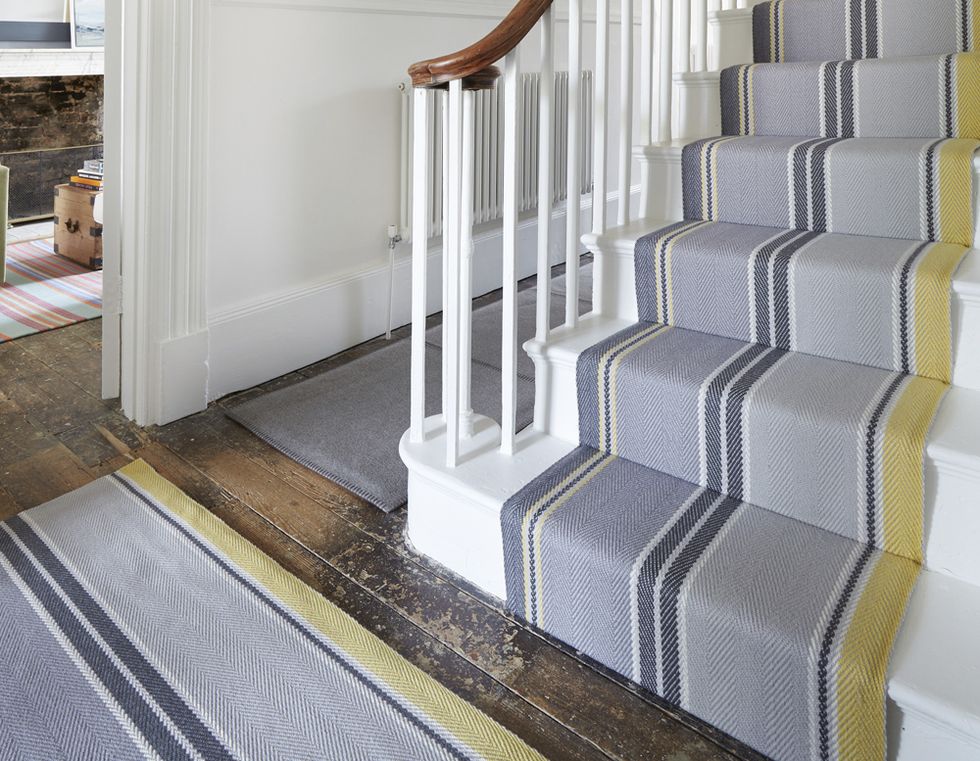 stripe carpet hallway and stairs