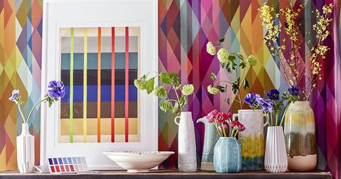 bold colourful pattern wallpaper and flowers