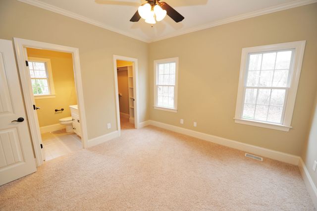 Wood, Room, Floor, Yellow, Flooring, Interior design, Property, Ceiling fan, Ceiling, Wall, 