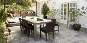 Outdoor living with wooden tables