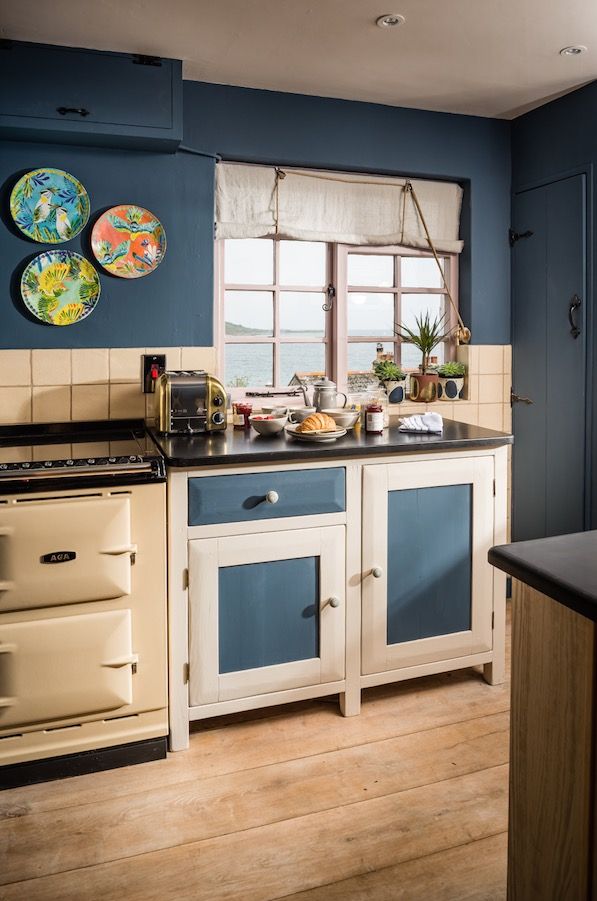 Blue colour themed kitchen in Siren cottage, Cornwall