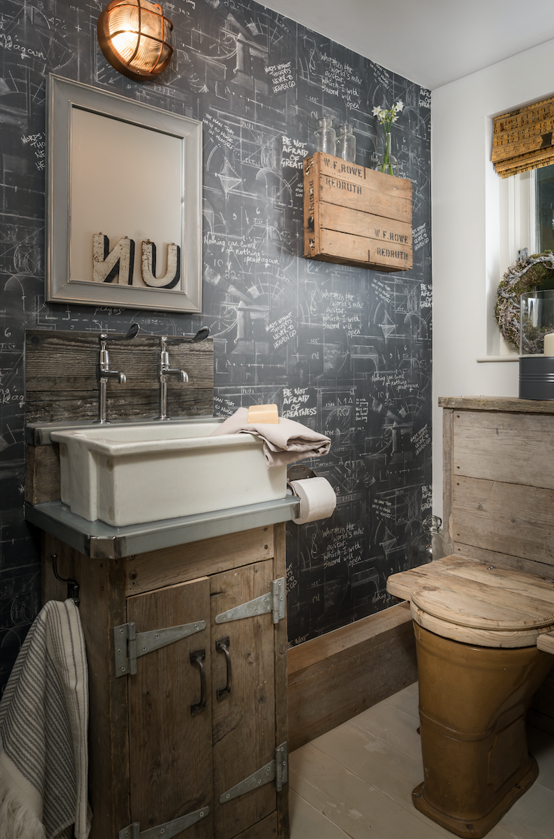 The Fable cottage in Cornwall - toilet in utility room with blackboard effect wallpaper
