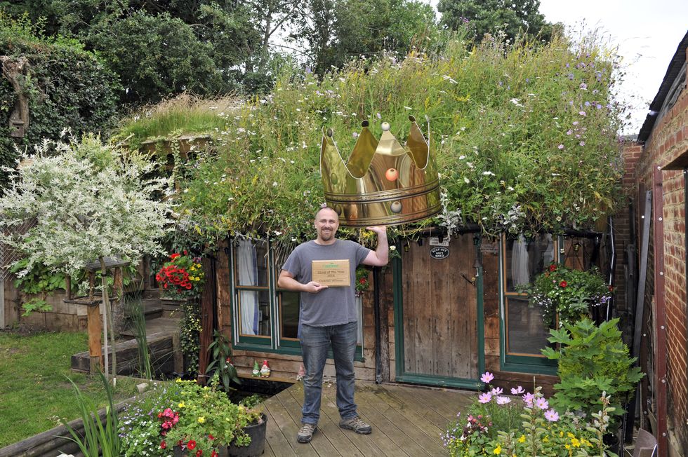 Cuprinol Shed of the Year 2016 winner Kevin Herbert with his eco-friendly shed West Wing