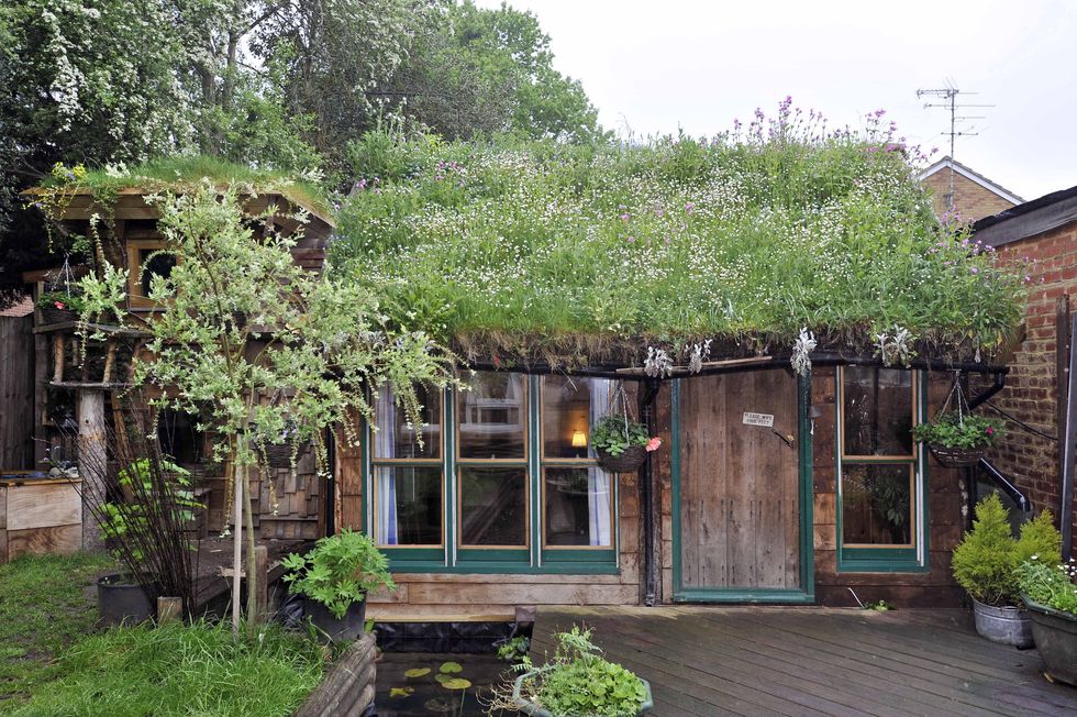 Cuprinol Shed of the Year 2016 winner Kevin Herbert with his eco-friendly shed West Wing