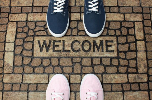 Welcome doormat with his and hers shoes