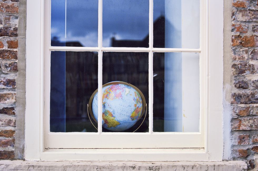 Globe, map of the world, on a windowsill