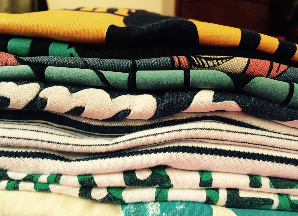 Close-Up Of Folded Clothes At Home