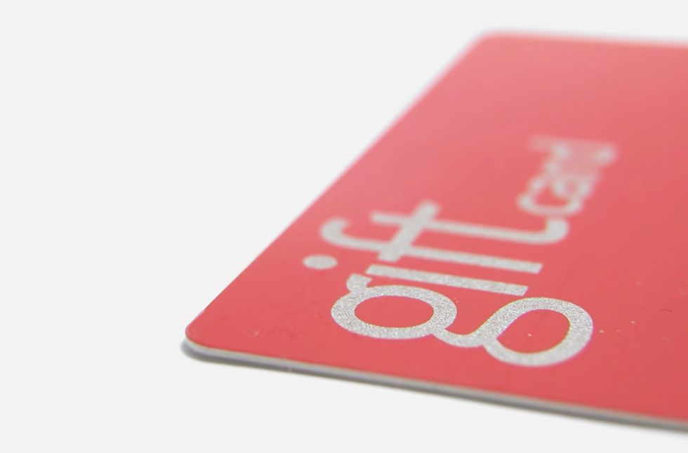 Side close-up view of a red gift card