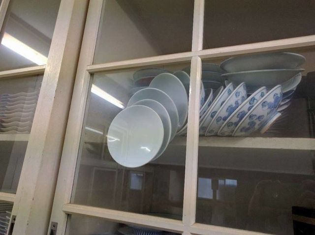 Plates falling in cupboard - Facebook post