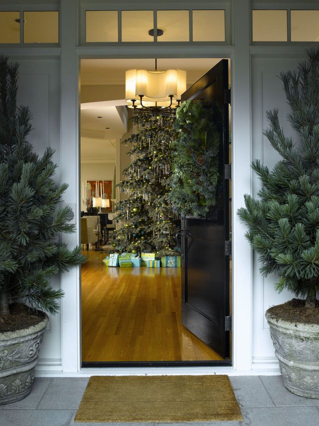 Doorway and Christmas tree with gifts