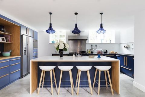 kitchen with modern design in blue and white colours