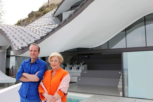 Caroline Quentin and Piers Taylor standing in front of home on cliff in Spain