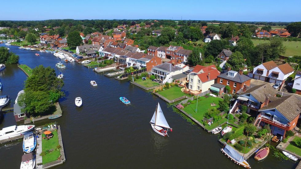 Large detached houses overlooking the River Bure
