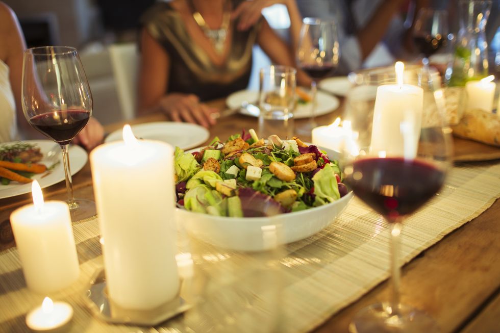Salad bowl on table at dinner party