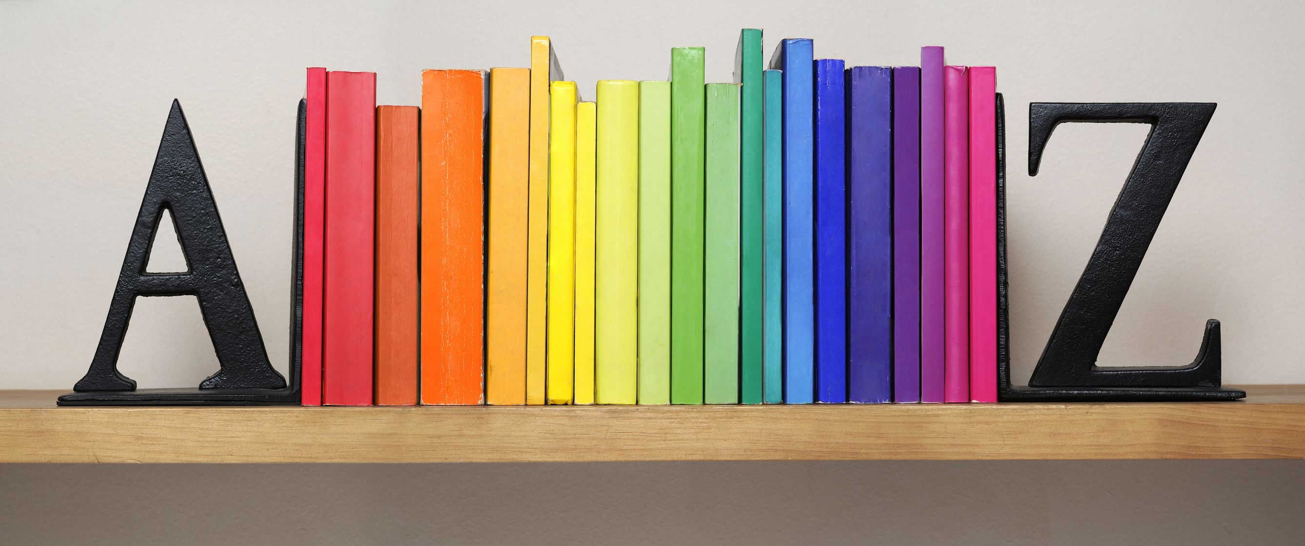 Everyone is currently obsessed with these rainbow bookshelves